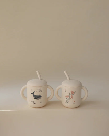 Mushie, silikonhallmugg, rosa blommor